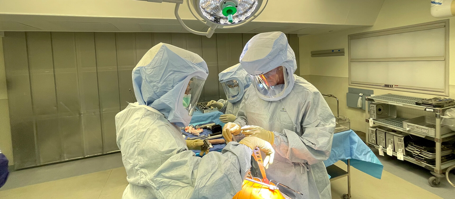Dr. Leone in operating room performing knee surgery
