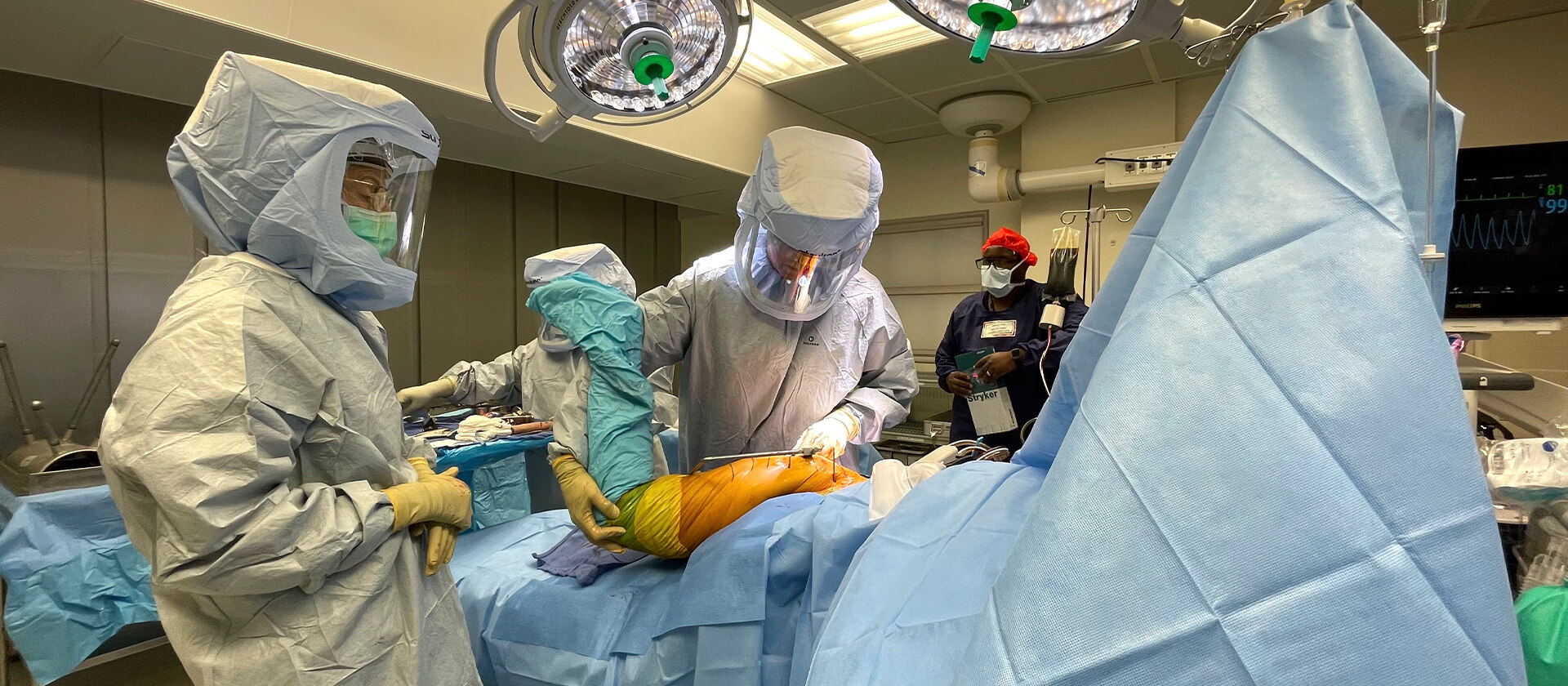 Dr. Leone in operating room performing hip surgery