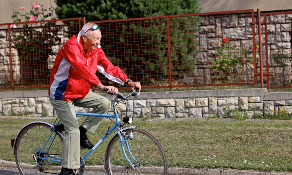 elderly patient gentleman on a bicycle