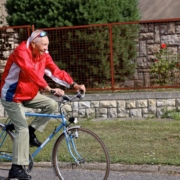 elderly patient gentleman on a bicycle