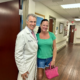 A female patient is standing next to Dr. Leone in his office. She had her 6 week check up.