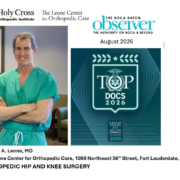 Dr. Leone is standing in his office and there is publication around him because he has won Top Doc 2026.